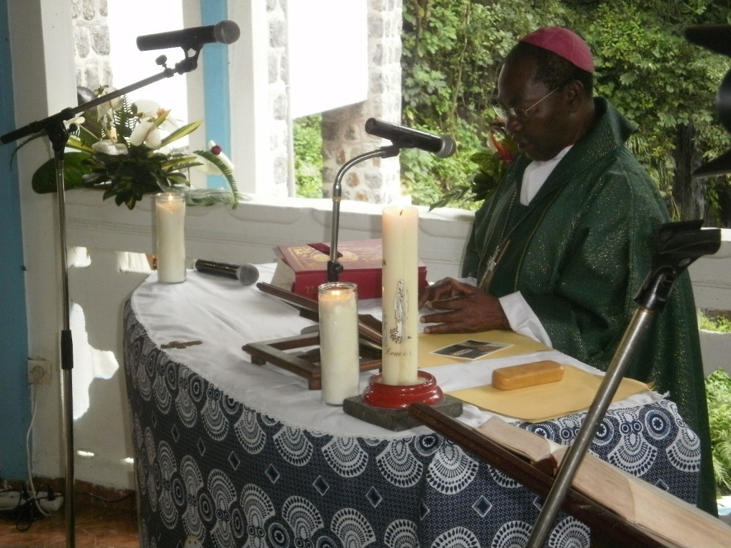 Archbishop Cornelius Fontem Esua delivers sermon at the altar in the chapel of Our Lady of Grace Shrine, Buea