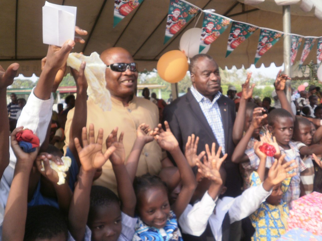 The DO of Dibombari (in glasses), Boniface Tene & the Mayor, Chief Frederic Nguime Ekollo commune with the children of Dibombari