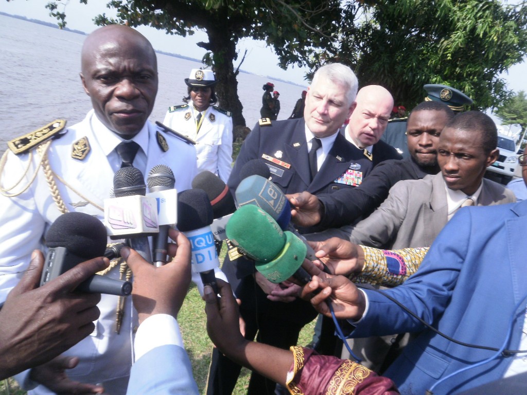 A Cameroonian Colonel (L) and Gen. Carter Ham (R) answer questions from the Cameroonian and international press on the Obangame Express 2013