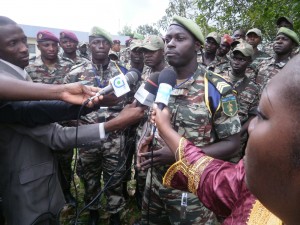 A Cameroonian soldier explains to the press what their training at Obangame Express 2013 is all about