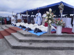 Mgr Bushu performs the Ordination rites on Deacons