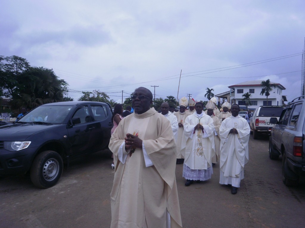 Mgr. Sebastian Behon leads the procession of Bishops