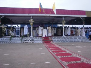 The Nuncio consecrates Coadjutor elect kneeling