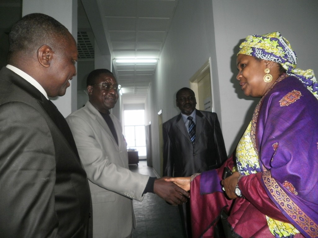 Secretary General, Southwest Governor's office Clement Fon Ndikum welcomes Hadiza while Governor Okalia Bilai looks onrs office Clement Fon Ndikum welcomes Hadiza while Governor Okalia Bilai looks on